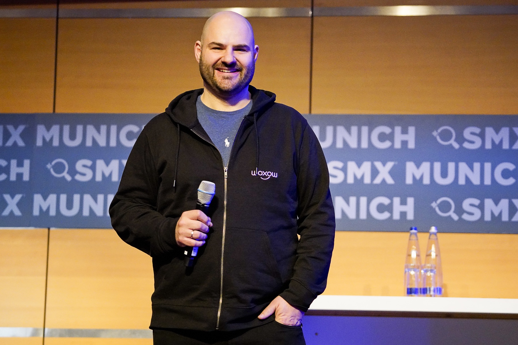 Timon Hartung presenting at a marketing conference